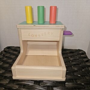 Lovevery Wooden Peg Drop Toy with Colorful Pegs